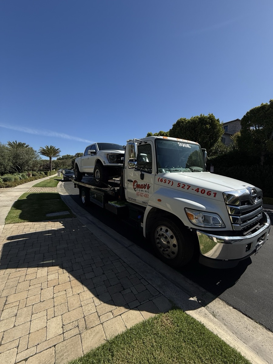 Omar's Towings branded Ram truck